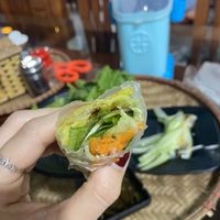 The proper way to roll it! (I had to watch a YouTube video) put the pancake inside the rice paper roll!!!  at Thuy Di Quan My Quang in Ha Giang