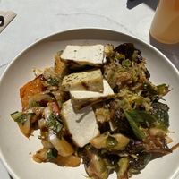 Tofu entree with Brussels and sweet potatoes  at Flower Child in Bethesda