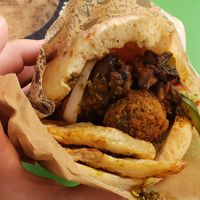 Falafel with fries/chips and every filling available at Falafel HaRova in Jerusalem