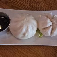 Left-steamed spicy tofu dumping. Right-char siu shitake bun. Loved the shitake bun, great flavor. The spicy tofu bun was ok. at Spicy Moon - 3rd St in New York City