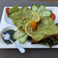 Toast with mashed avocado at Adam's Cafe in Tamraght