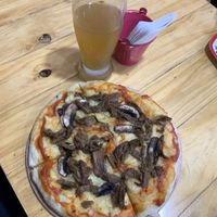 Pizza meat is murder 👌🏽 at Mercy Vegan Food in Bogota