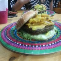 Burger con onion rings at Mercy Vegan Food in Bogota