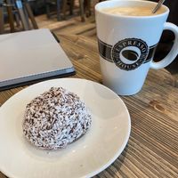 Oatmilk flat white and vegan chocolate ball at CPH - Espresso House - T2 in Kastrup