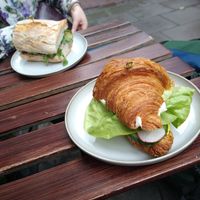 Very tasty croissant with vegan egg pasta and with cucamber, radish and lettce and also tasty sandwich with vegan "fish" pasta and with vegetables. at Szklarnia in Krakow