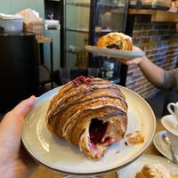 Croissants filled with raspberry or chocolate 😍 at Szklarnia in Krakow