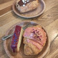 Pain au chocolat, raspberry croissant, and orange cake at Szklarnia in Krakow