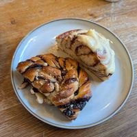 Bakes - cinnamon bun with frosting and chocolate bake. at Szklarnia in Krakow