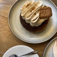 Gingerbread bun with clotted cream and coffee   at Szklarnia in Krakow