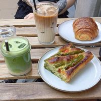 Matcha, Iced Latte. Savory focaccia and french pain au chocolat at Szklarnia in Krakow