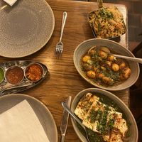 Rice with veggies and herbs, potato curry, spinach and tofu curry  at Namaste Holborn in London