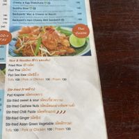 Menu (March 2024). Note: V sign is for vegetarian, vegan is not listed.   at The Backyard Cafe & Bistro in Koh Lanta