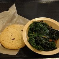 Freakishly delicious kale and a choc chip cookie. :) at Good Foods Market and Cafe in Lexington