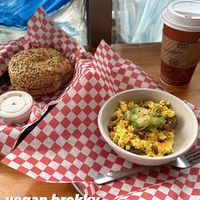 Everything bagel with FANTASTIC vegan cream cheese, oat milk latte, and the veganized breakfast bowl  at Moe Joe in Clemson
