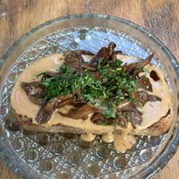 Toast de manteiga de amendoim com cogumelo  at Tectonica in Sao Paulo