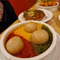 Egusi bowl and rice pancake at Chuku's in North London