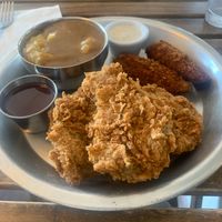 Fried chicken plate with mash and jalapeño poppers.  at Dirty Lettuce in Portland