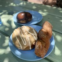 Maple coffee donut plus chocolate with custard   at Grumpy & Runt in Western Cape