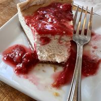 Vegan Cheesecake with graham cracker crust, strawberry, rhubarb, pinelake cellar compote.  at Box Bar in West Seattle