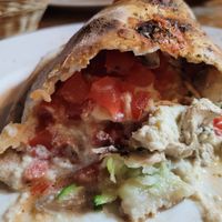 Calzone opened😊 at Carpe Diem di Verdi in Banos De Agua Santa