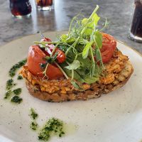 Tofu bacon on sourdough with avocado and tomatoes   at LEAF Smithdown in Liverpool