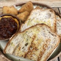 Deep fried Camembert with apple chuntney and sourdough toast .  at Peachy Goat in South East London