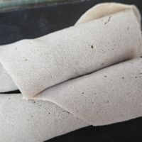 Injeera at Ras Plant Based in Brooklyn