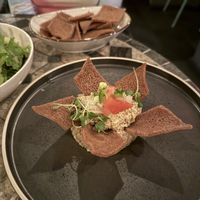 Lentil dip with injera chips  at Ras Plant Based in Brooklyn