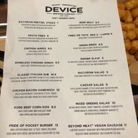 Here’s the menu.  Large order of tots visible in the background.   at Device Brewing Company in Sacramento