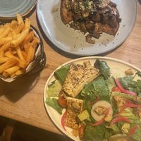 Mushroom toast(made vegan), fries, and salad with tofu added.   at Kome in Willemstad