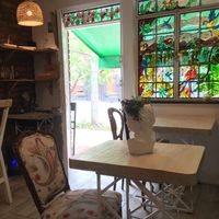 There are five tables inside and I think a couple outside   at Iom Cocina Plant-Based in Bogota