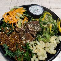 Custom bowl with tempeh & more at Iom Cocina Plant-Based in Bogota