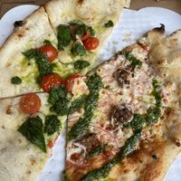 Blanco margarita pizza with vegan cheese and create your own with regular cheese and vegan meat {soy base}  at Community in Wimberley