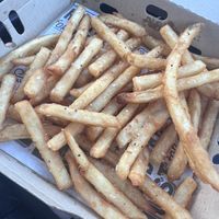Fries ordered as vegan (they omit the ranch flavoring and use salt and pepper instead).  Best fries we’ve had in a long time!!  at Meltz in Coeur D Alene