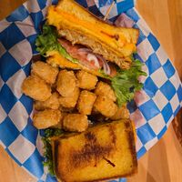 Cheeseasaurus - 2 grilled cheese (daiya) sandos with an impossible patty + tots at Food Factory in Fairbanks