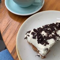 flat white and cream toffee cake  at Coffeedesk Kawiarnia in Warsaw