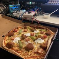 Falafel pizza to go. March 2020   at Deli Italia Södermalm in Stockholm