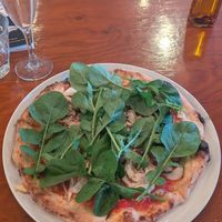 Quatro fungi pizza with rocket salad added and some chili oil!! at Parco Della Pace  in Hiroshima