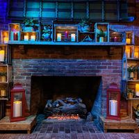 comfortable fire place seating at The Tipsy Toboggan in Fall River