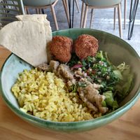Rice, garbanzo balls, salad, baba ganoush at INA Restaurante in Medellin