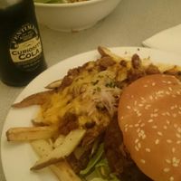 burger, which was served cold, with sub cheese fries and kale salad at Garden to Grill in Sacramento