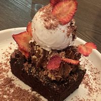 Ferrero Rocher tarta with coconut gelato, strawberries, chocolate, and nut soil  at Vandal in Newtown