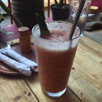 Smoothie orange pineapple strawberry (Q20) at Macuy in Flores