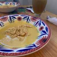 Soup & drink from lunch menu  at Madreselva in Bogota