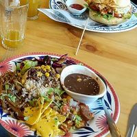 The Mexican dish (also came with a delicious soup, not pictured) and the vegan burger. Juices were complimentary! at Madreselva in Bogota