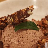 a chocolate ganache, with fleur de sel caramel, dark chocolate granola with timut pepper and a leaf with a taste of honey!
 at Dis Leur in Bordeaux
