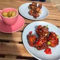 Olives. Sticky glazed sausage. Cauli bites at Shrub in Chester