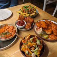 Loaded fries, fried artichokes, tofu and camembert at Shrub in Chester