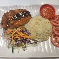 vegetarian chicken rice or black pepper chicken chop rice? $5/6?  at Red Apple Veggie Cafe 红苹果素食 - Fortune Centre in Central Singapore