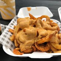 Curly fries with cheeze sauce at The Gnarbecue in Croydon